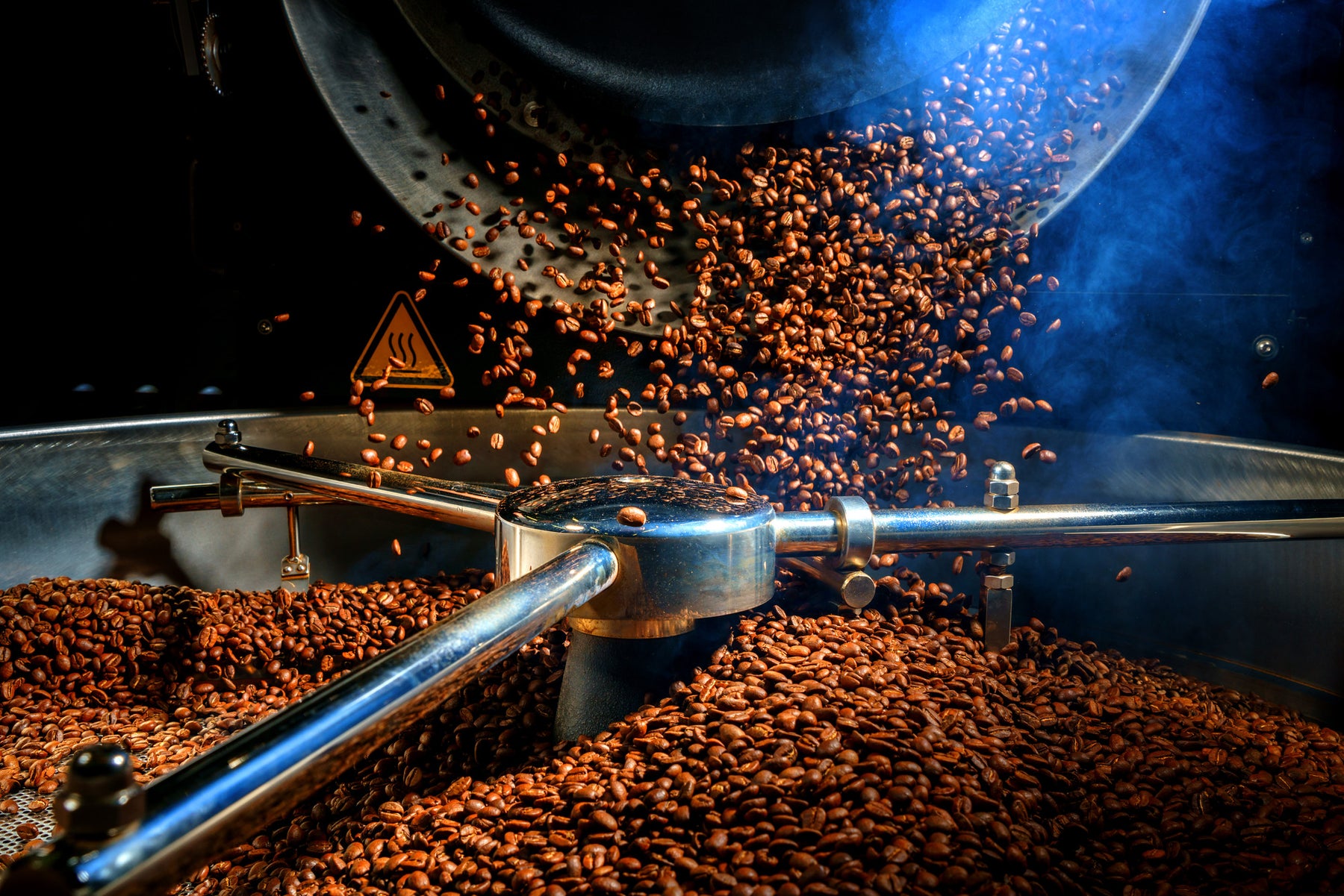 Mixing roaster showing coffee beans being roasted